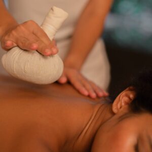 Thai Herbal Compress Massage women having thai herbal compress at Heaven Therapy Cullercoats