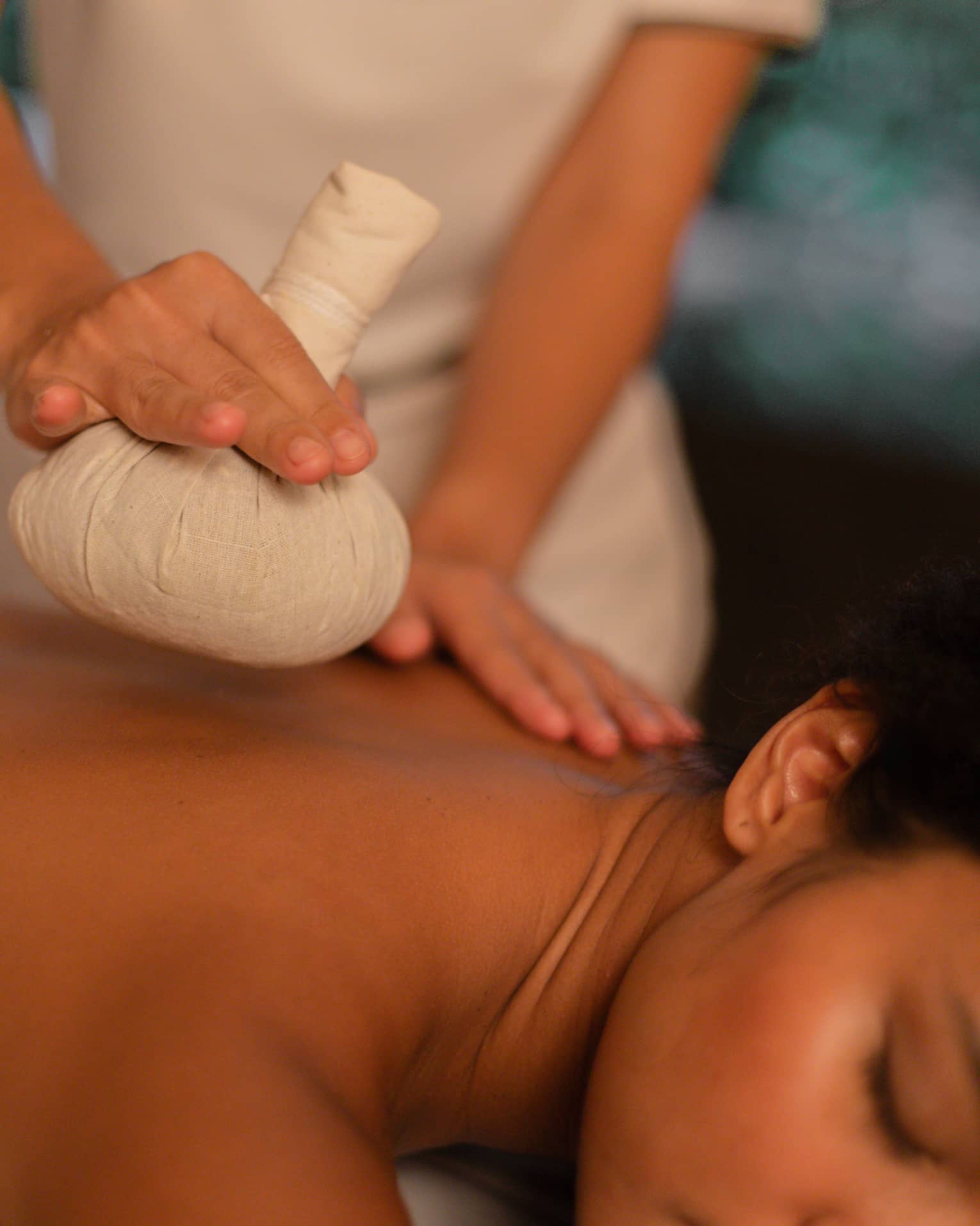 Thai Herbal Compress Massage women having thai herbal compress at Heaven Therapy Cullercoats